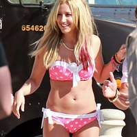 Ashley Tisdale is rolling in bikini