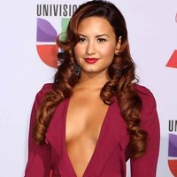 Demi Lovato almost exposing her perky boobs