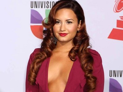Demi Lovato almost exposing her perky boobs