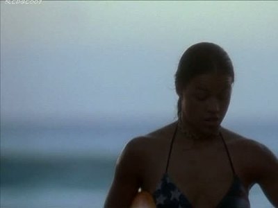 Young and busty Michelle Rodriguez in ‘Blue Crush’