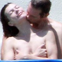 Milla Jovovich topless and spicy bikini pics