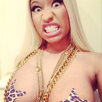 Nicki Minaj twits her topless pictures!