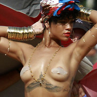 Is it so sexy? Rihanna in big panties with almost naked boobs!