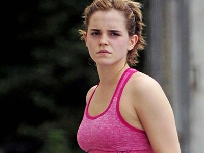 Young Emma Watson in pink sport bra